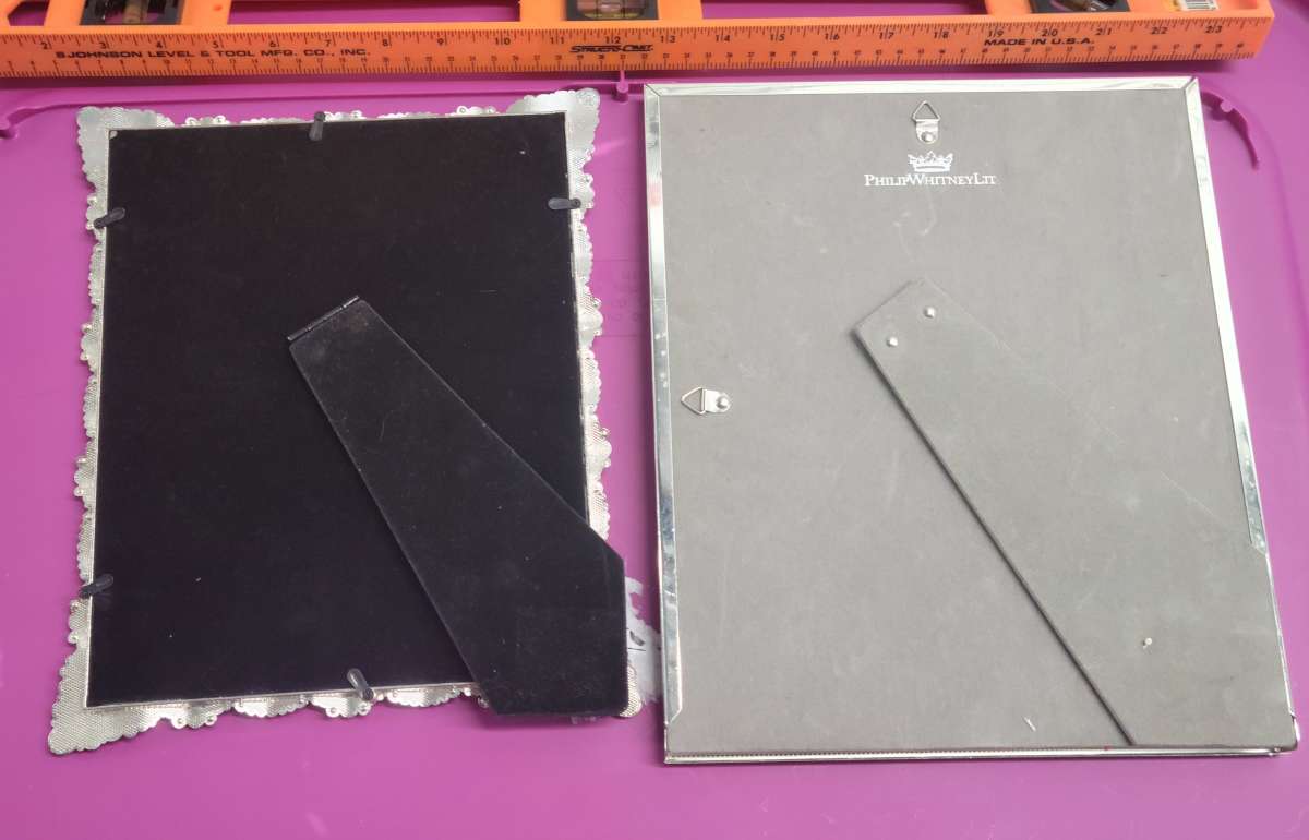 2  8x10 Photo Frames 1 Pearl and Embellished 1 Silver Mirror