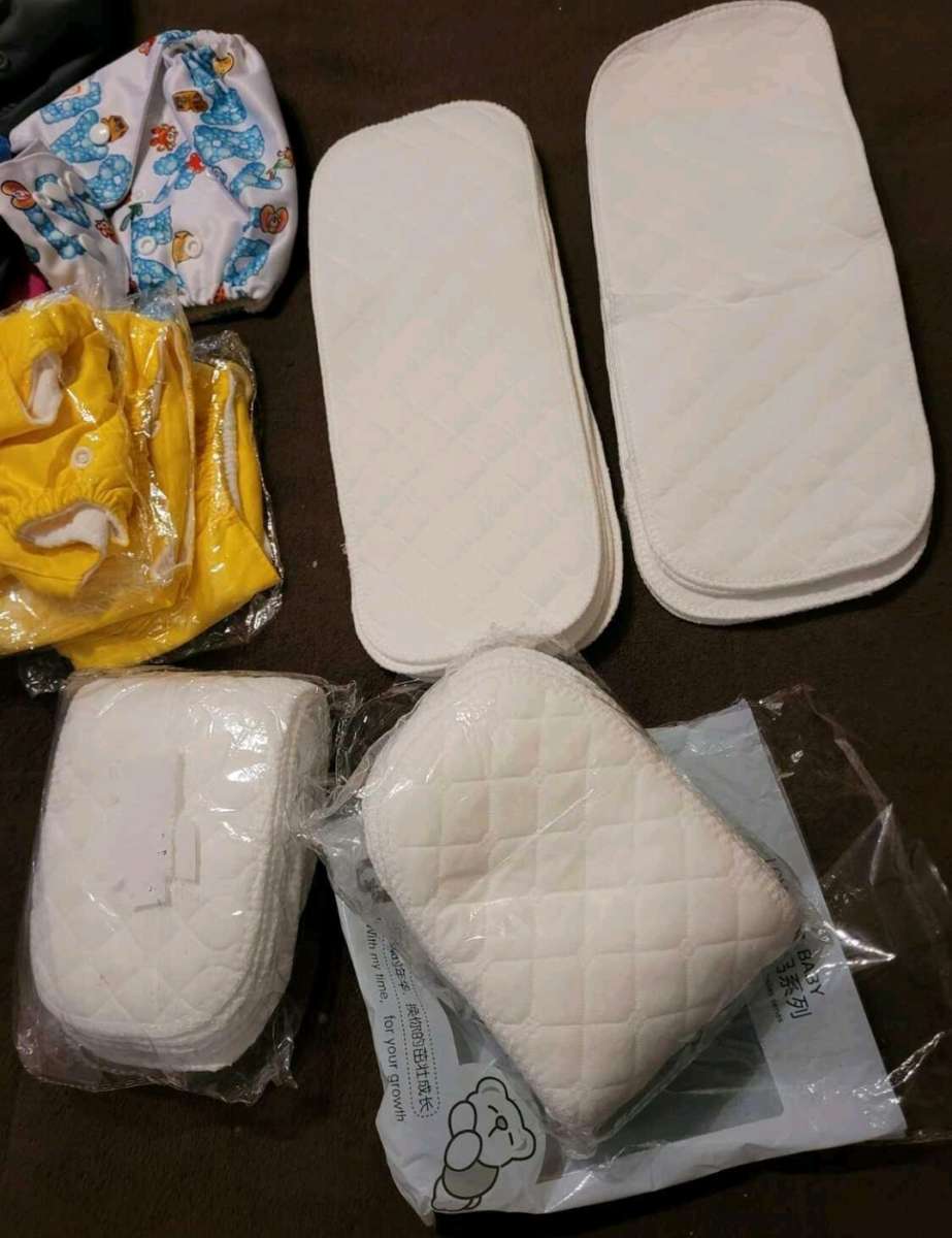 NEW 9 WASHABLE DIAPERS AND 30 PADS