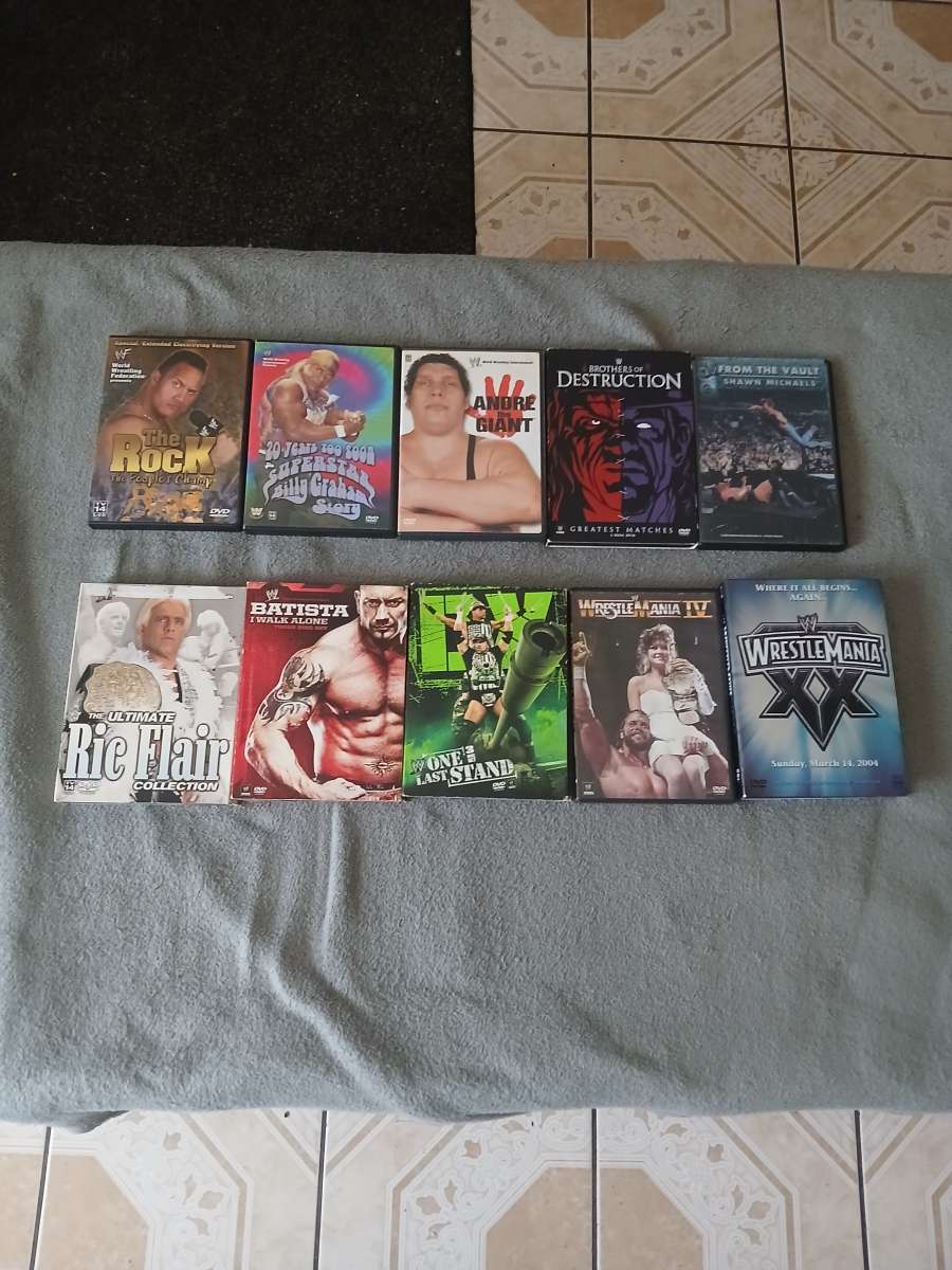 Lot Of 26 WWE And TNA Impact Wrestling DVDs