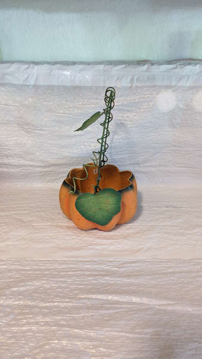 Orange And Green Paper Mache Pumpkin Basket with a Green Met