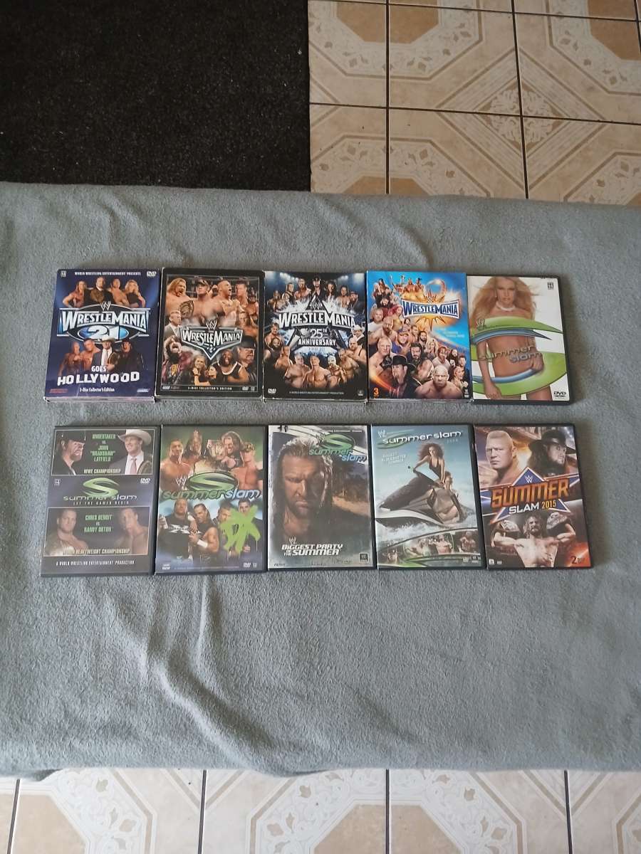 Lot Of 26 WWE And TNA Impact Wrestling DVDs
