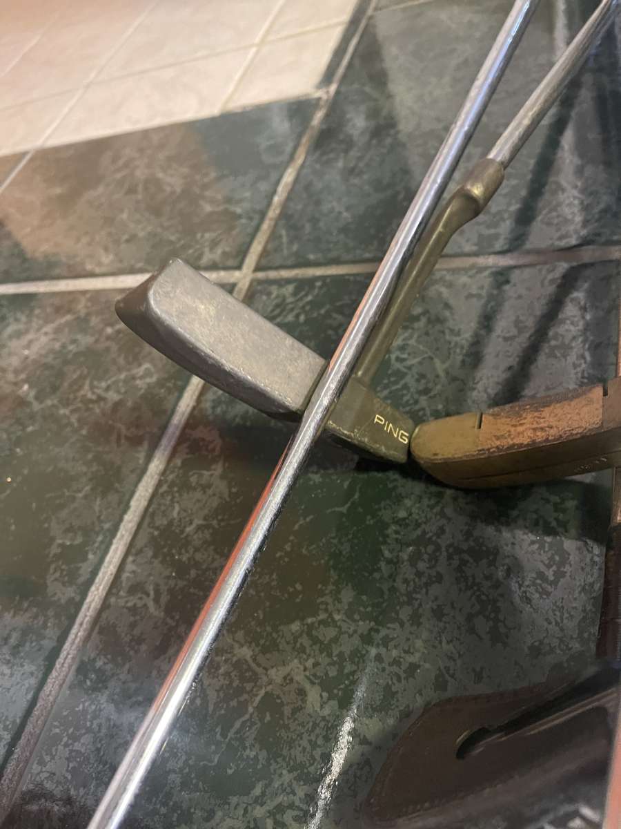 huge lot of golf clubs