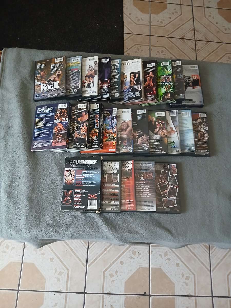 Lot Of 26 WWE And TNA Impact Wrestling DVDs