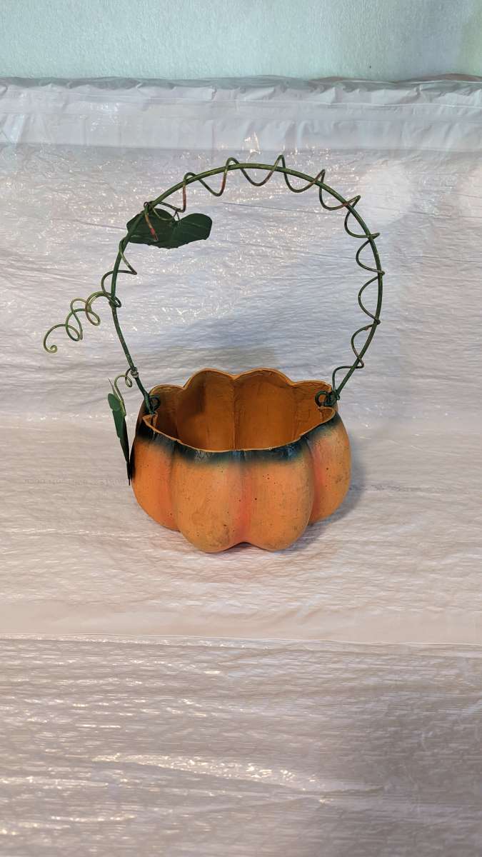 Orange And Green Paper Mache Pumpkin Basket with a Green Met