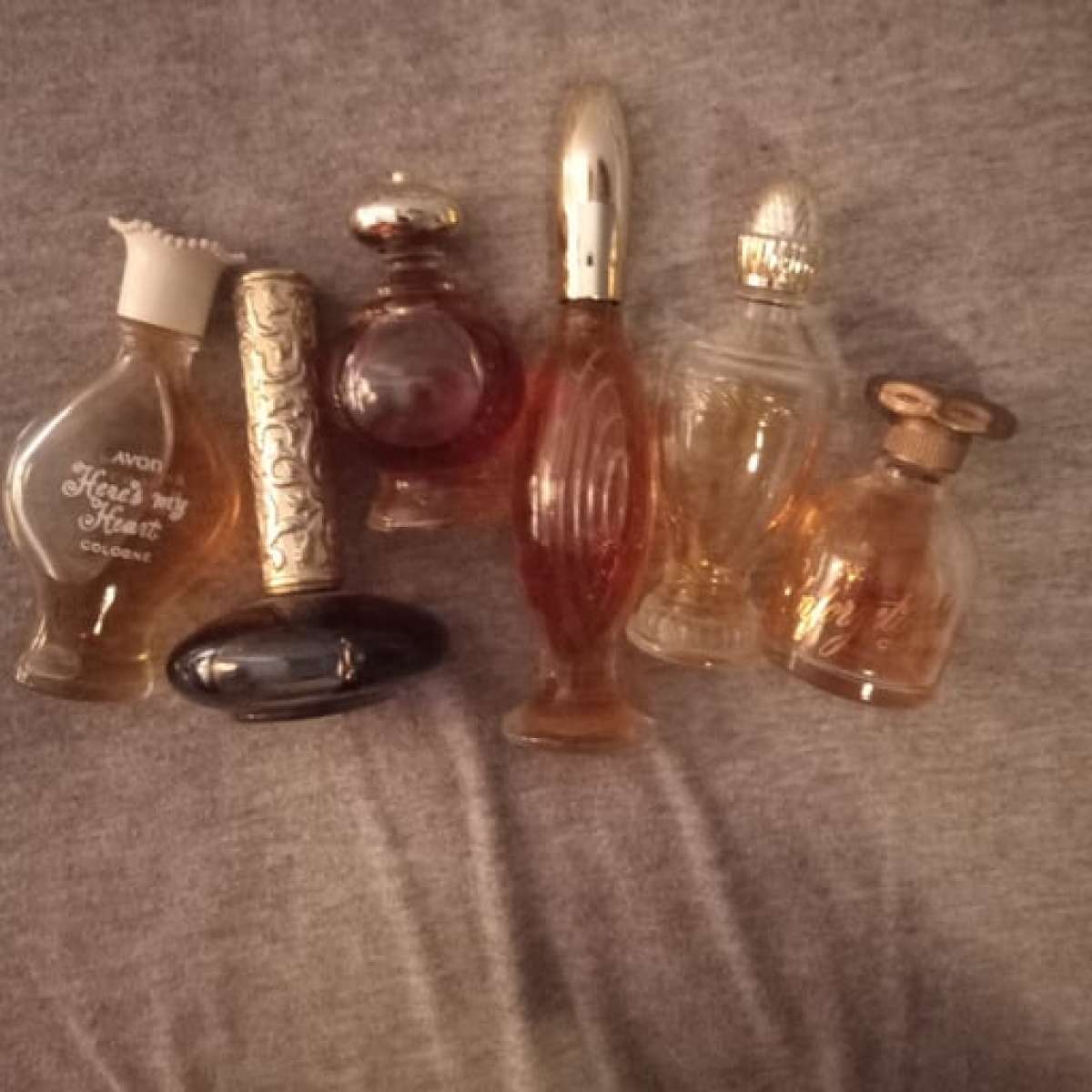 several vintage avon perfume