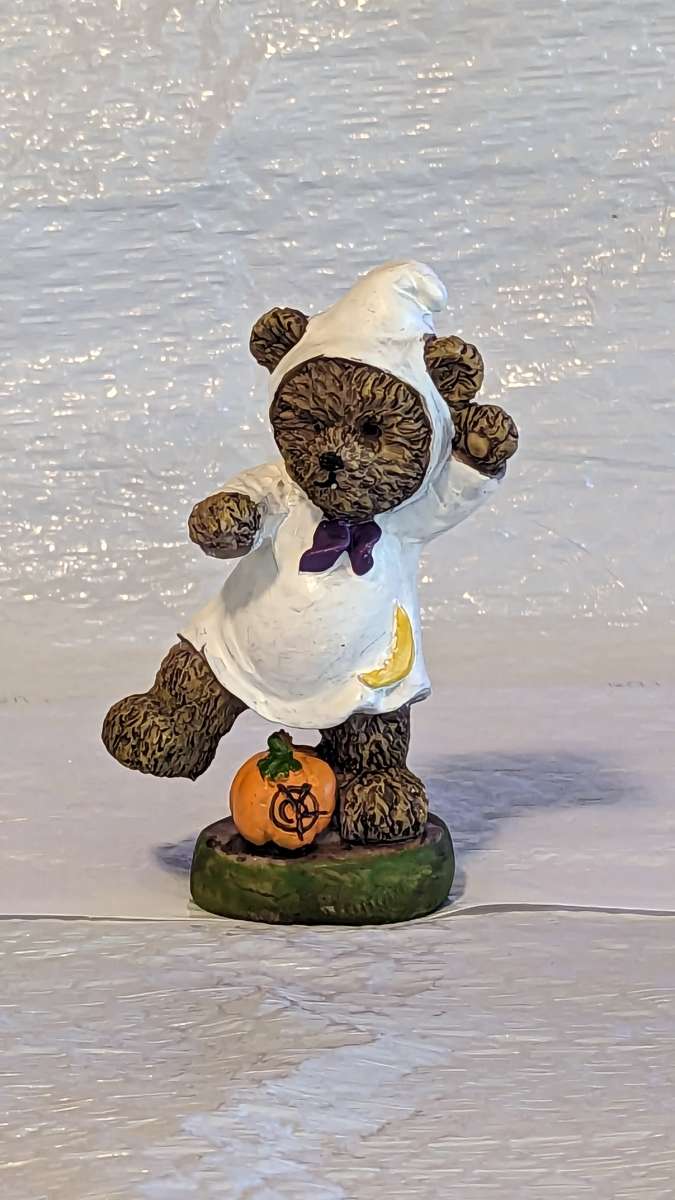 Resin Teddy Bear in a Ghost Costume with a Pumpkin