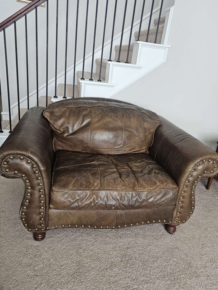 leather sofa with matching chair and ottoman