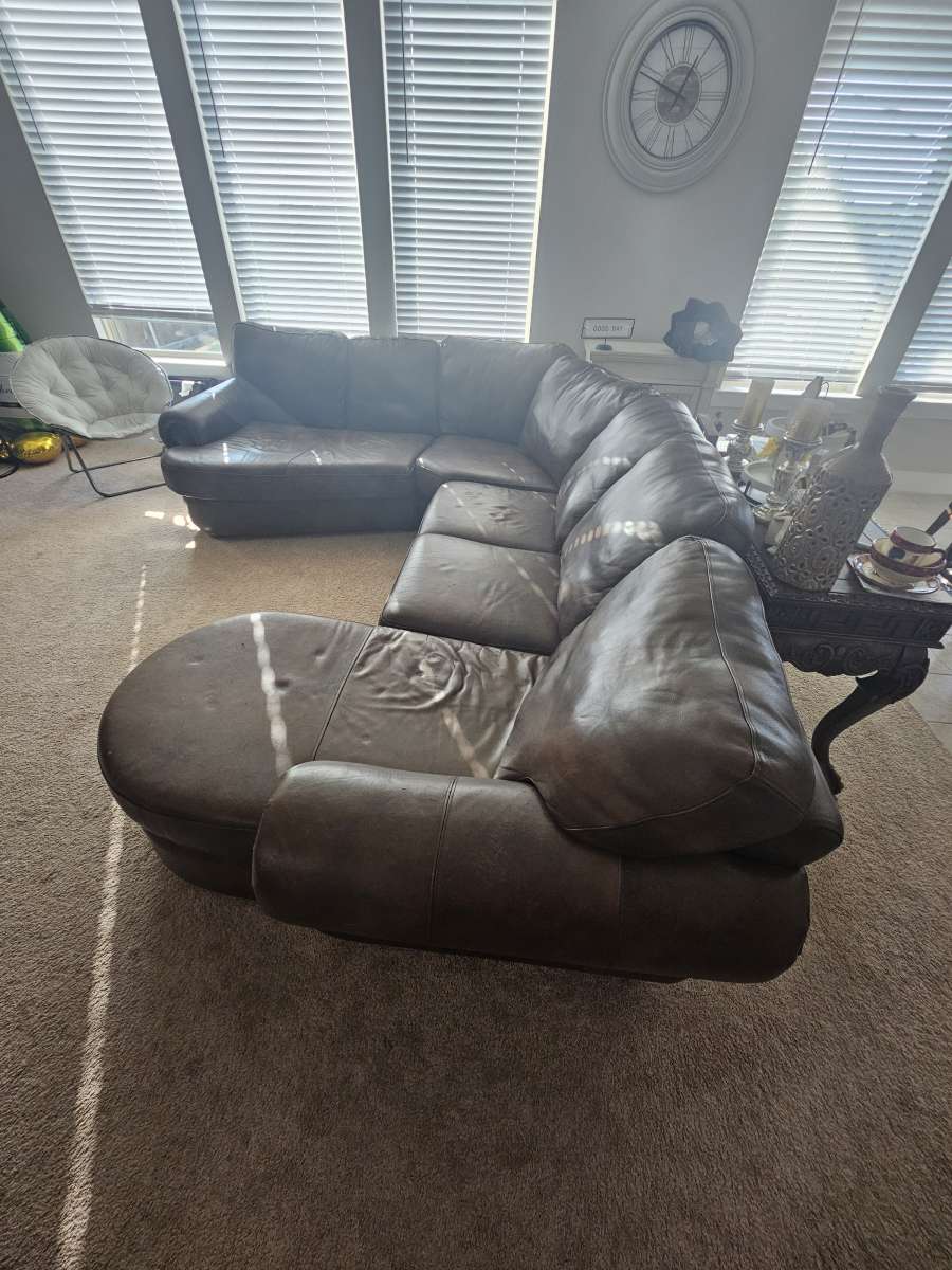 leather sofa with matching chair and ottoman