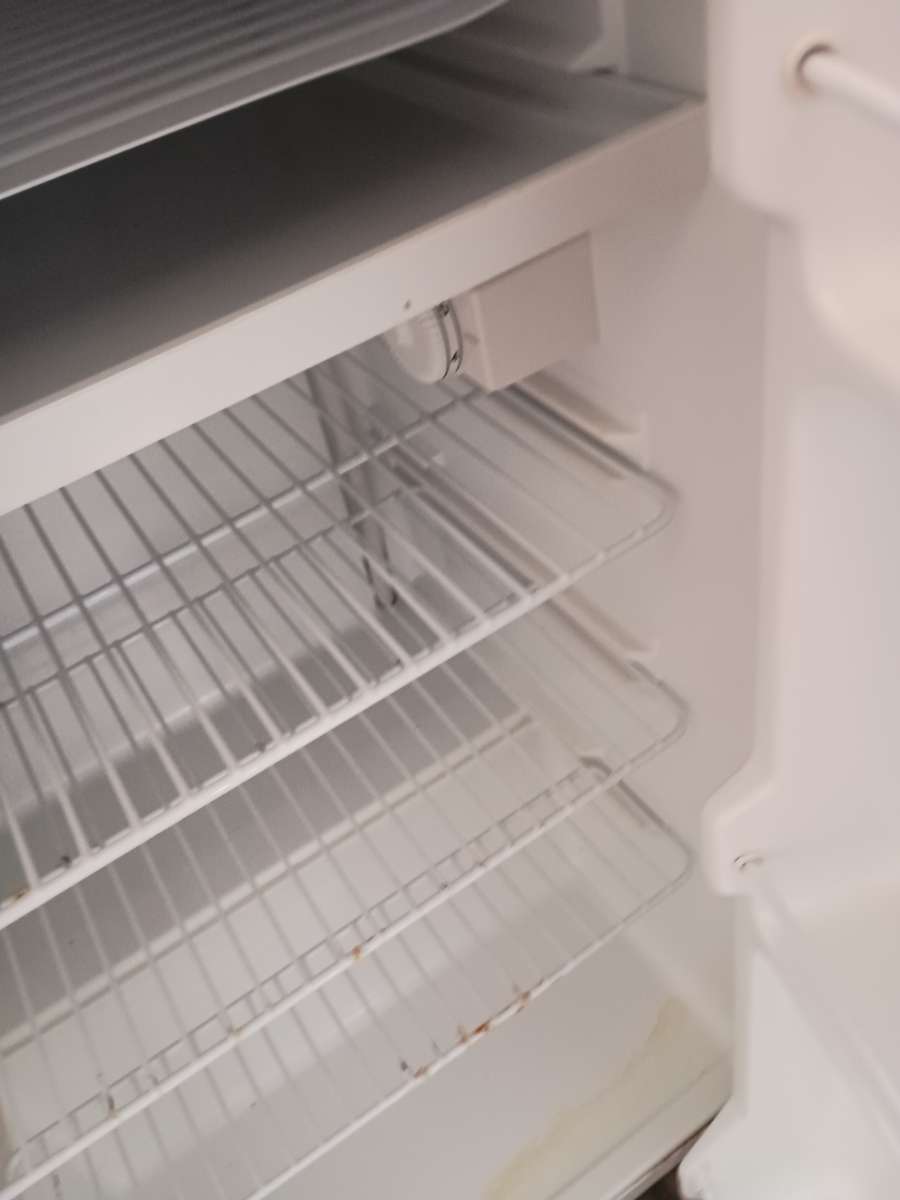 Kenmore mini fridge works fine needs a new hinge