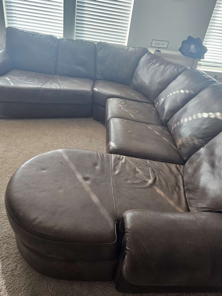leather sofa with matching chair and ottoman
