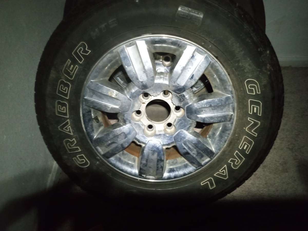 18 in 6 lug Chevy rims x3