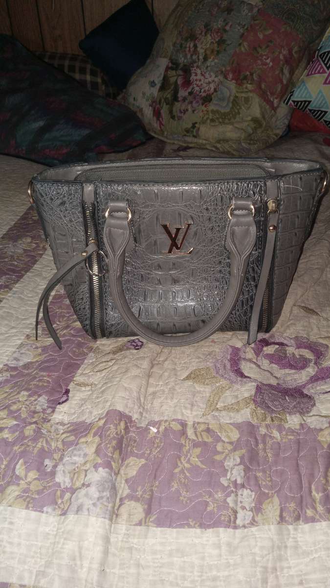 Louis Vuitton grey handbag with crocodile pattern