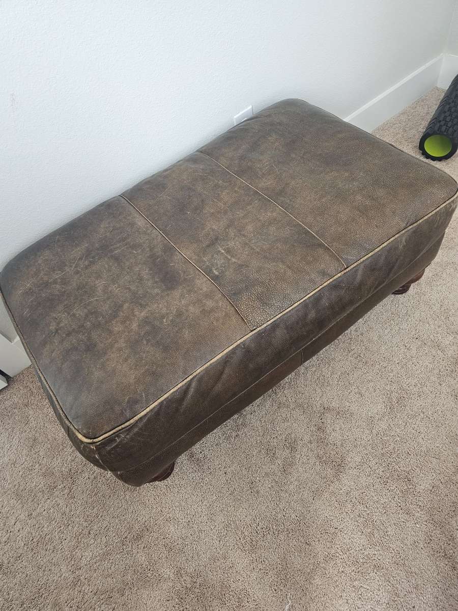 leather sofa with matching chair and ottoman