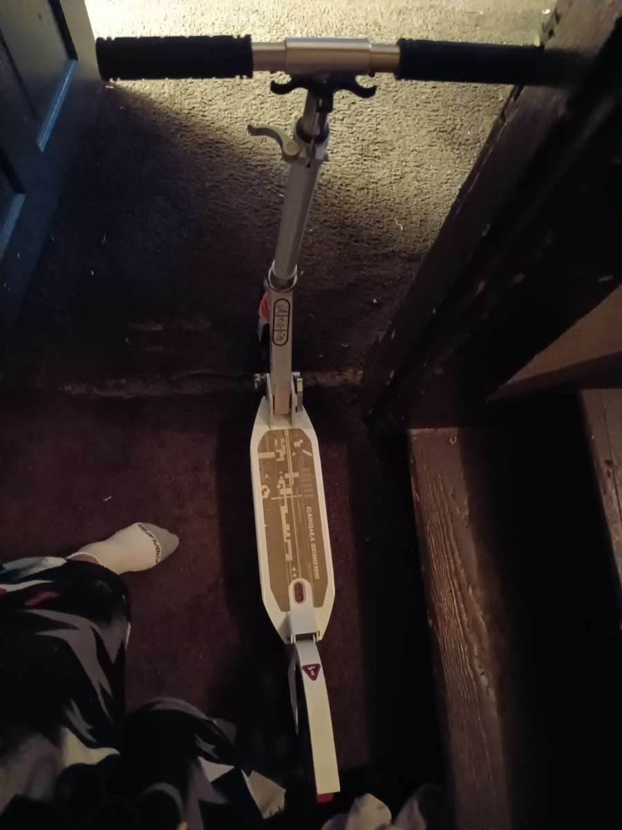 black grey and white scooter