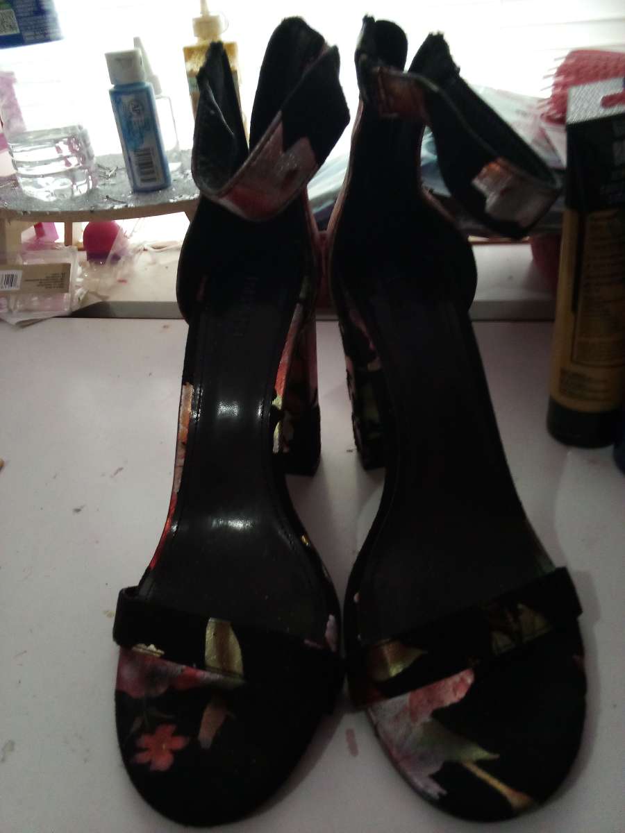 high heel pink and black shoes