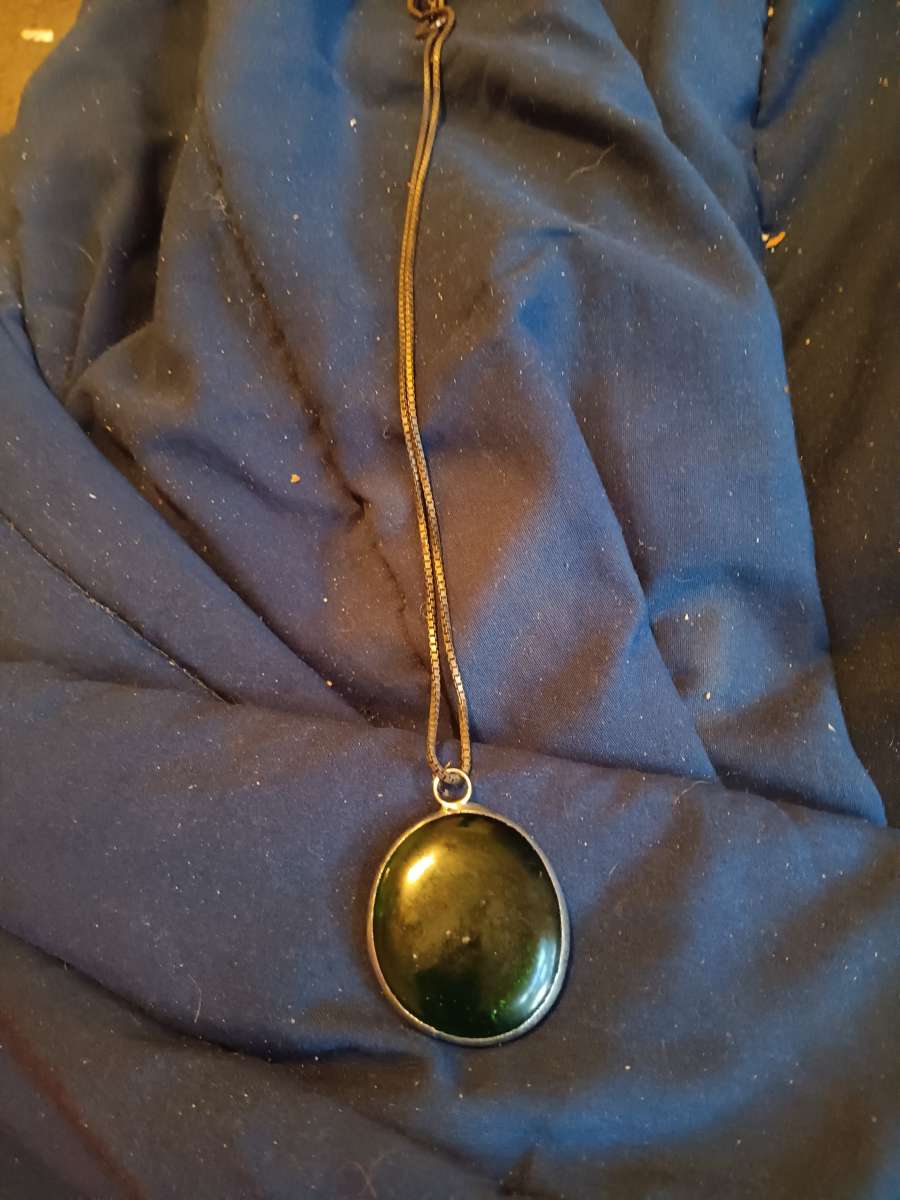 women pendant on chain