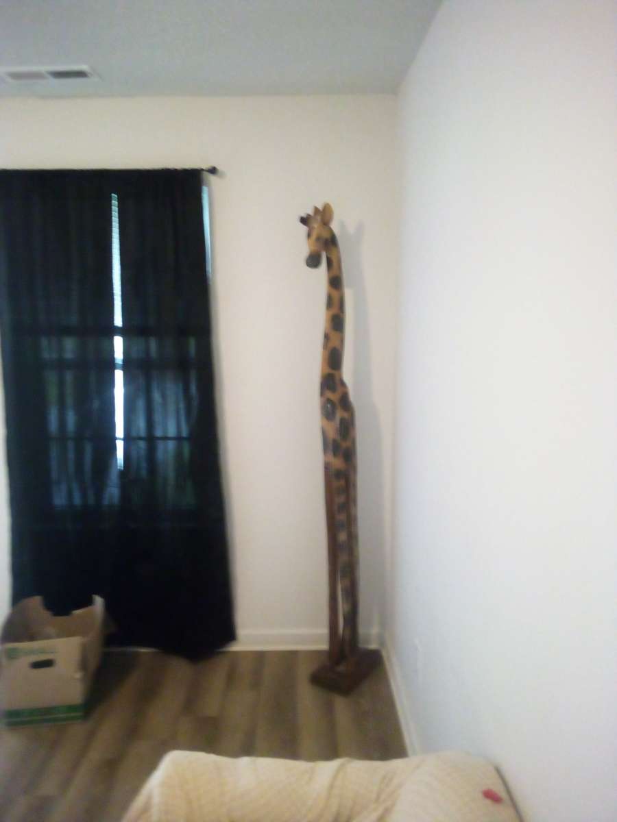 7 foot tall wooden giraffe