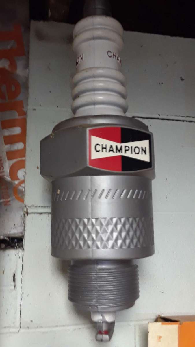 early 70s plastic champion spark plug ad prop