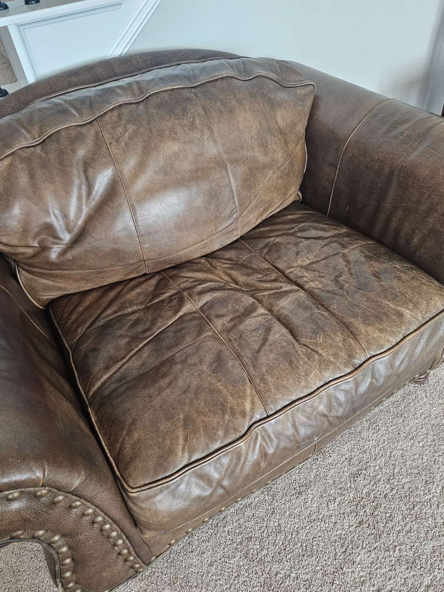 leather sofa with matching chair and ottoman