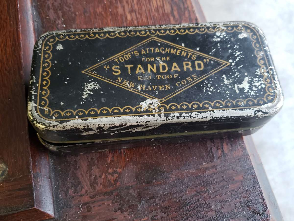 1907 Goldsmith sewing machine and table