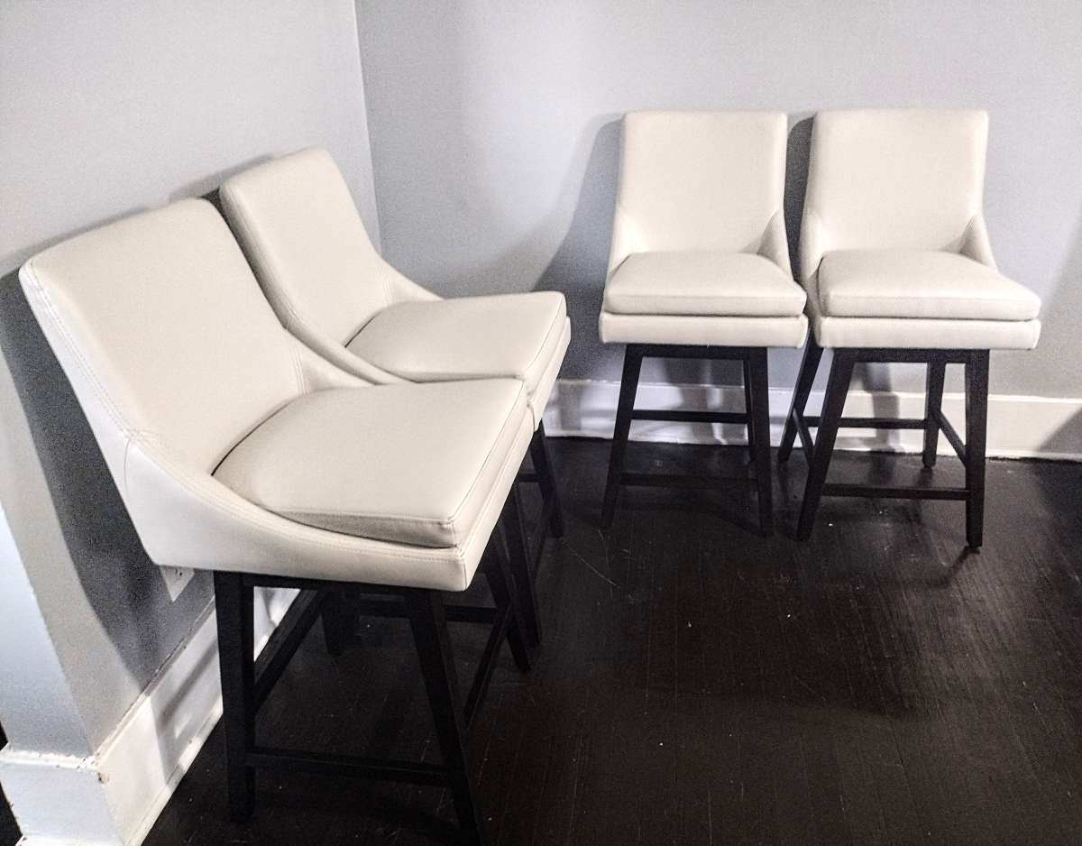 Lissa Light Gray Faux Leather Swivel Counter Stool Set Of 4