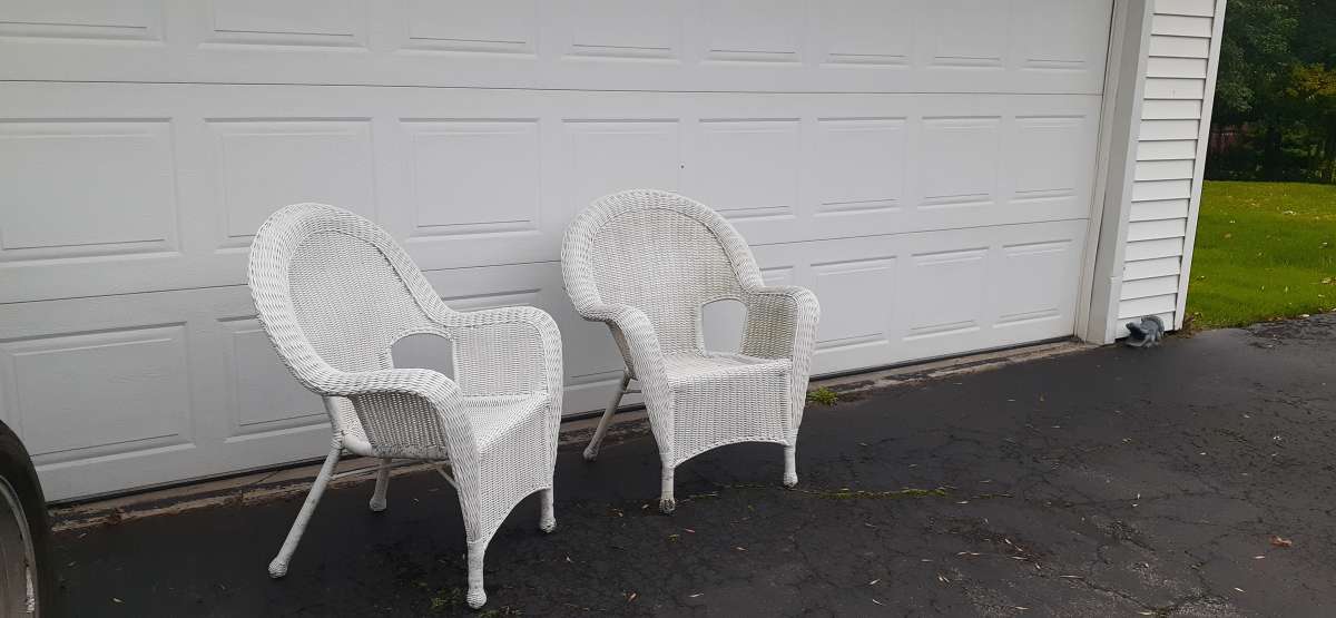 2 resin white wicker chairs