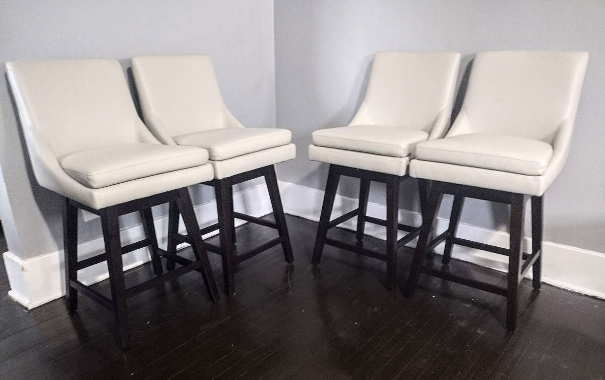 Lissa Light Gray Faux Leather Swivel Counter Stool Set Of 4