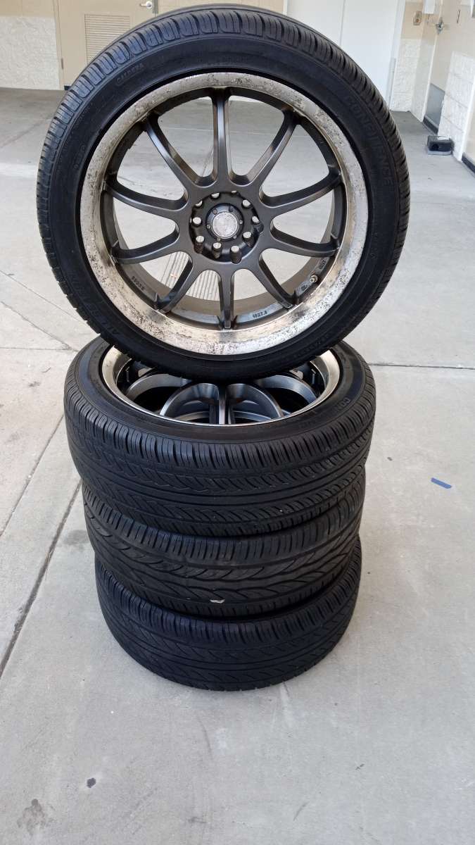 the set of 4 tires wheels R 18