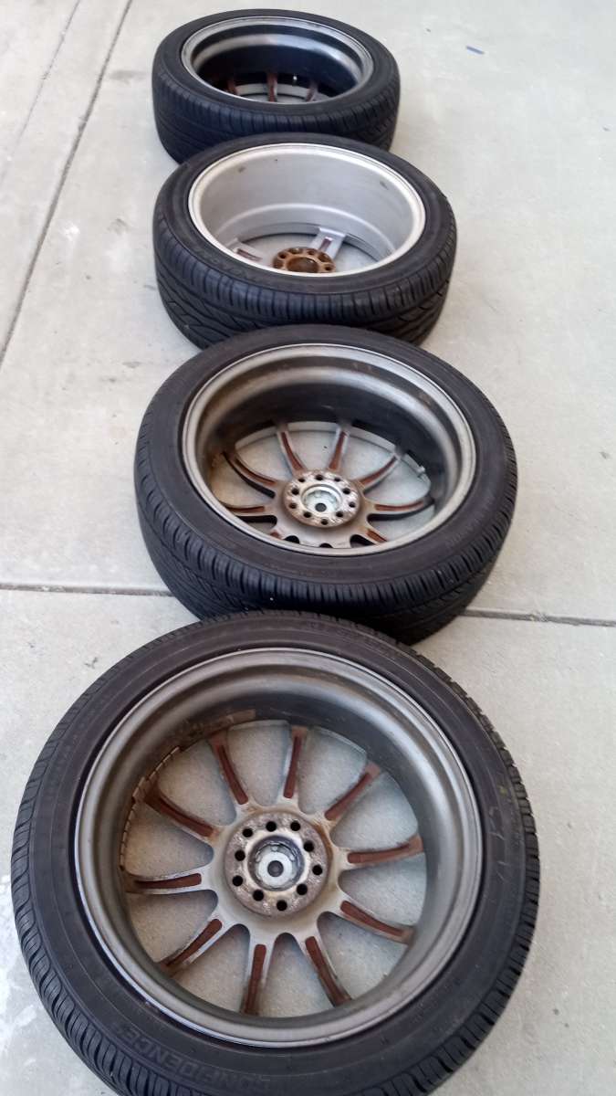 the set of 4 tires wheels R 18