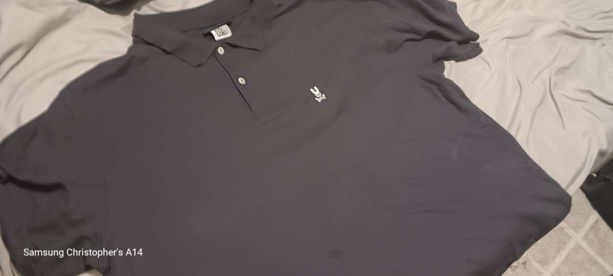 a 2x Pyscho Bunny Polo style dress shirt