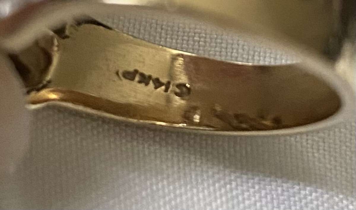 Custom made 14 karat gold diamond ring