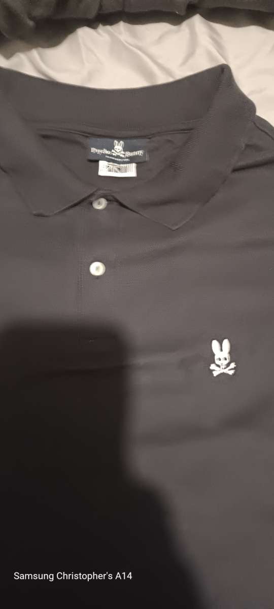 a 2x Pyscho Bunny Polo style dress shirt
