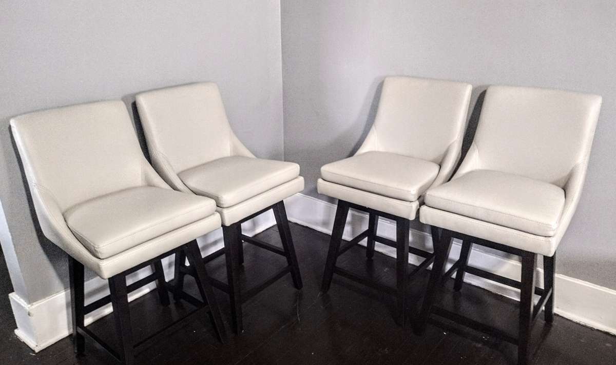 Lissa Light Gray Faux Leather Swivel Counter Stool Set Of 4