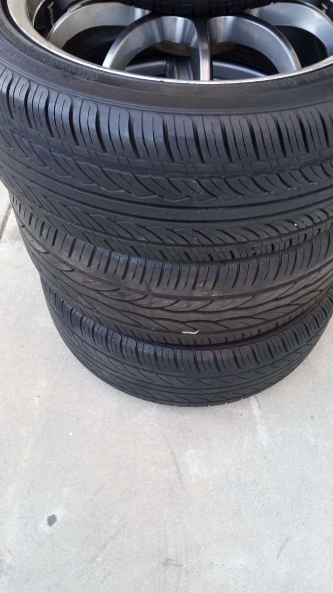 the set of 4 tires wheels R 18