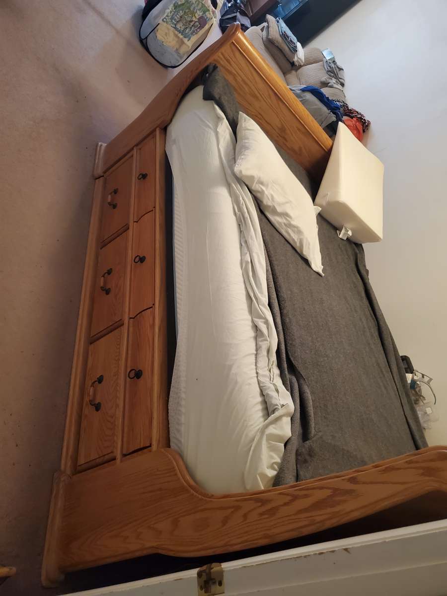 Solid oak queen sleigh platform bed with 12 drawers