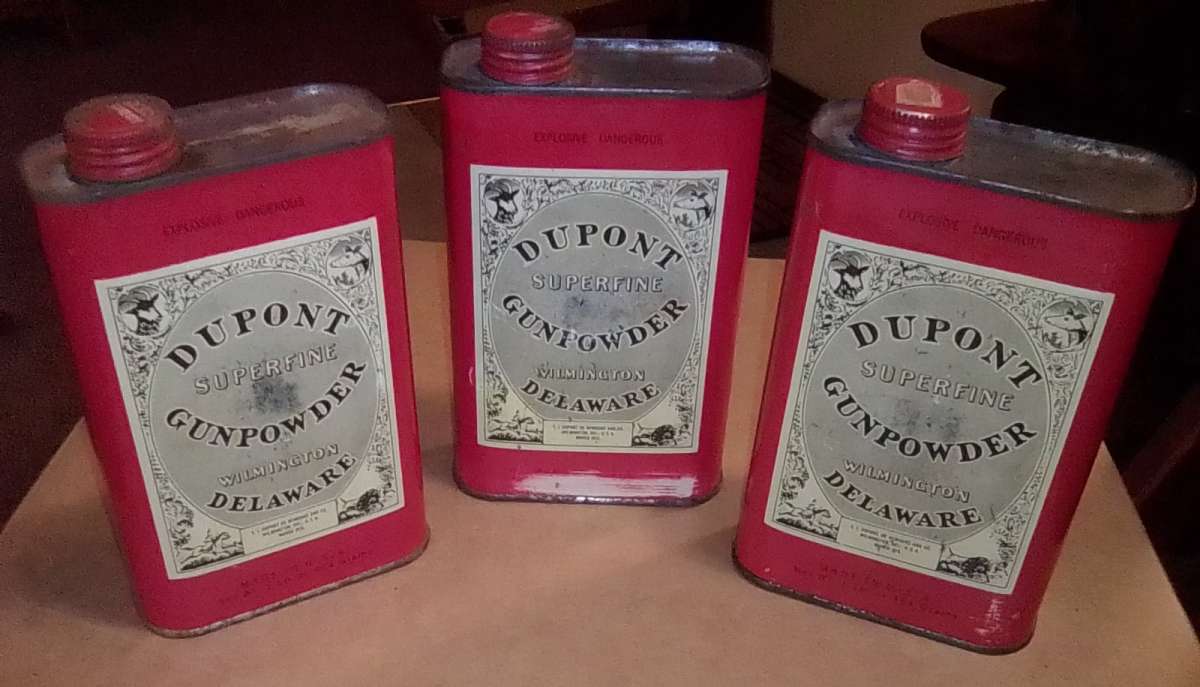 collection of gunpowder tins