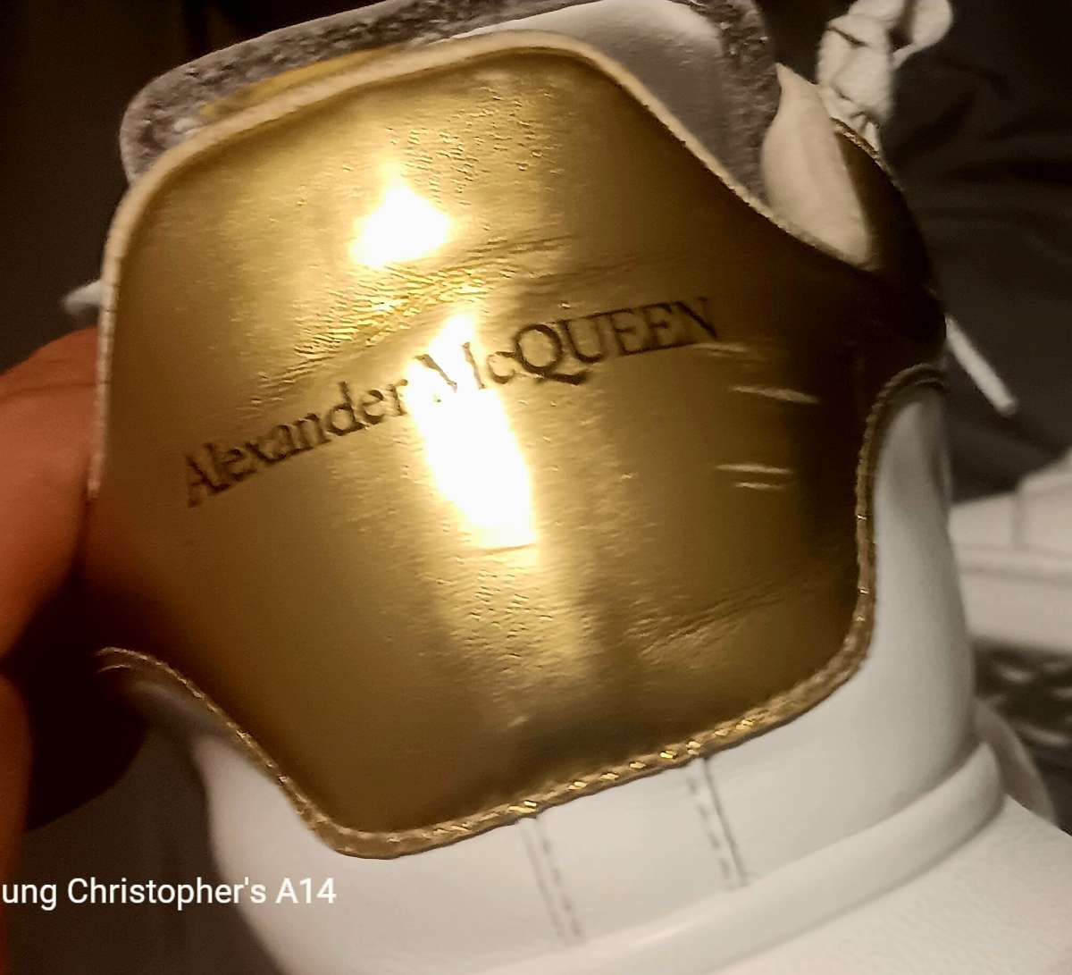 a pair of Alexander McQueen sneakers  size 9