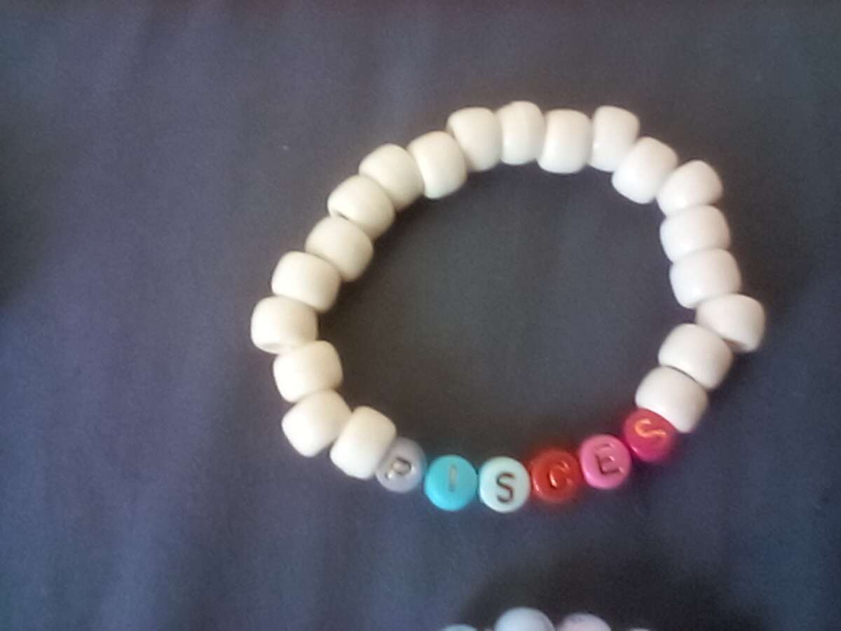 handmade bead and string zodiac bracelets I made myself