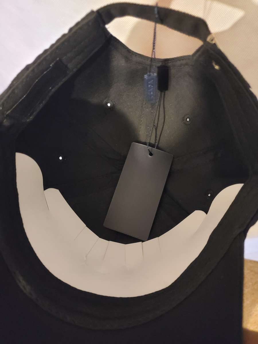 Prada logo and signature cap