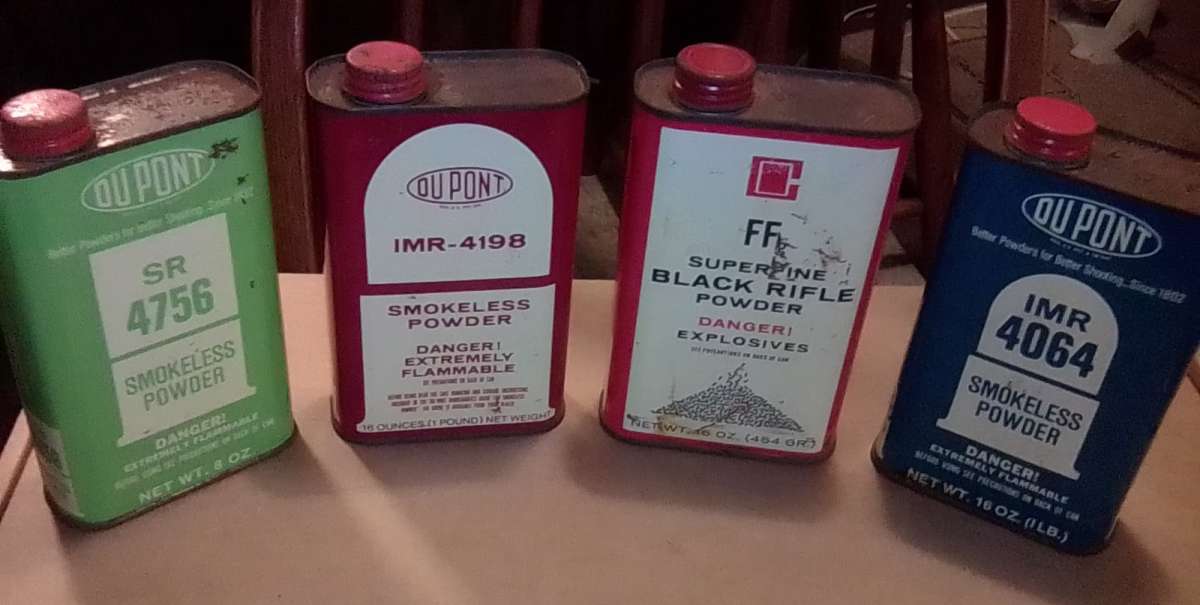 collection of gunpowder tins