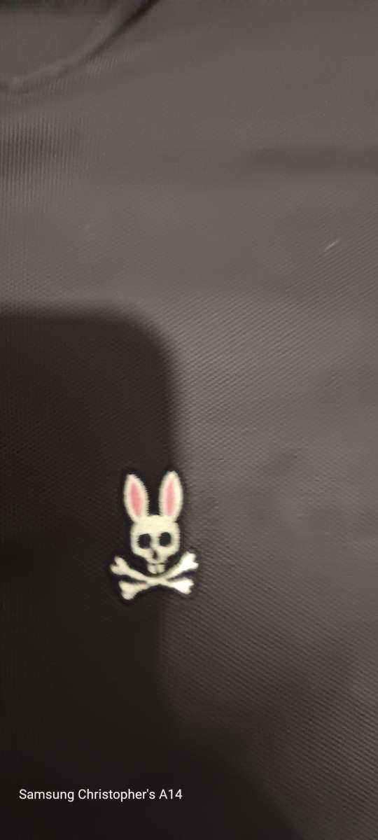 a 2x Pyscho Bunny Polo style dress shirt