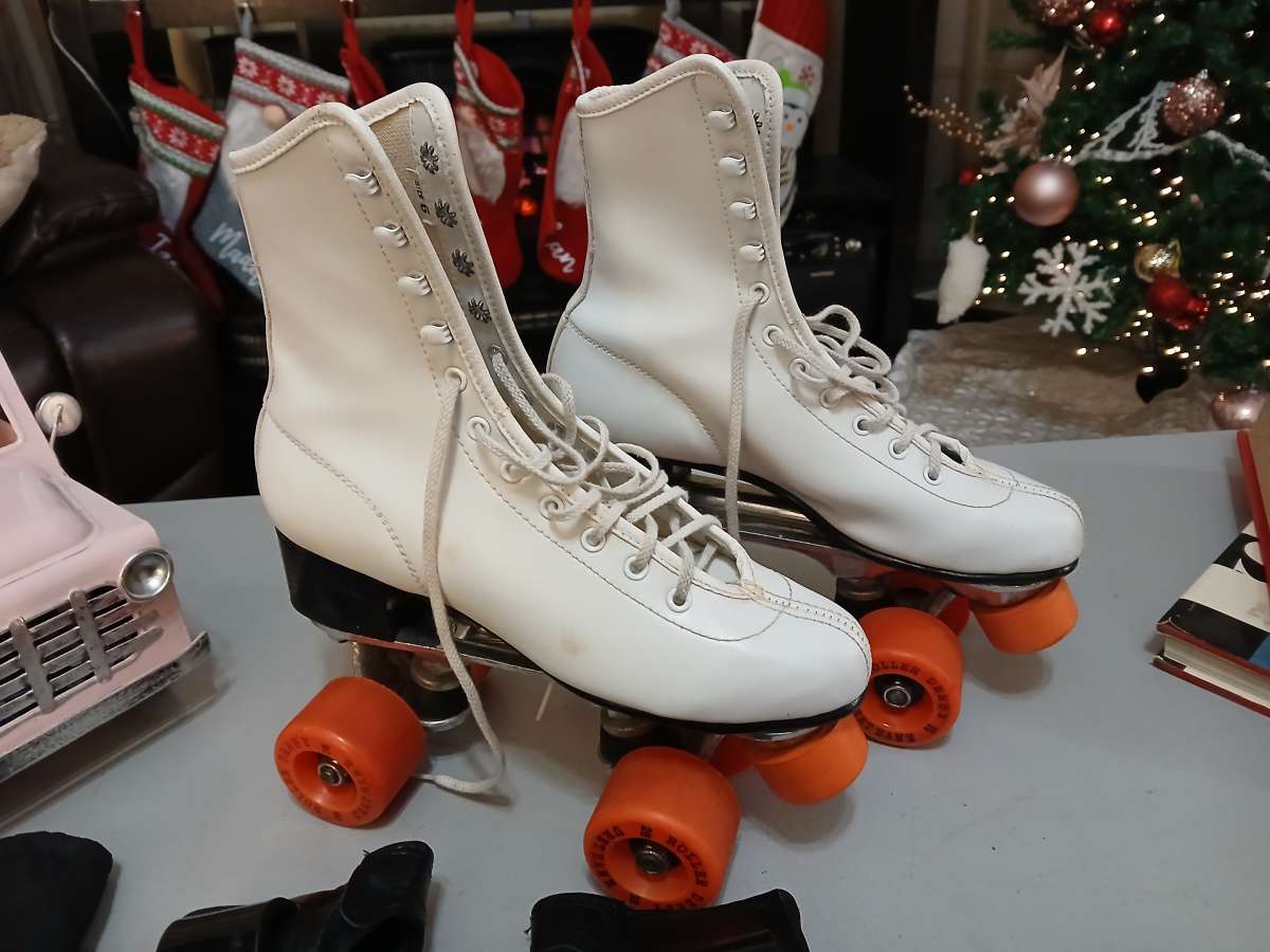 Roller Derby classic roller skates with pads and guards