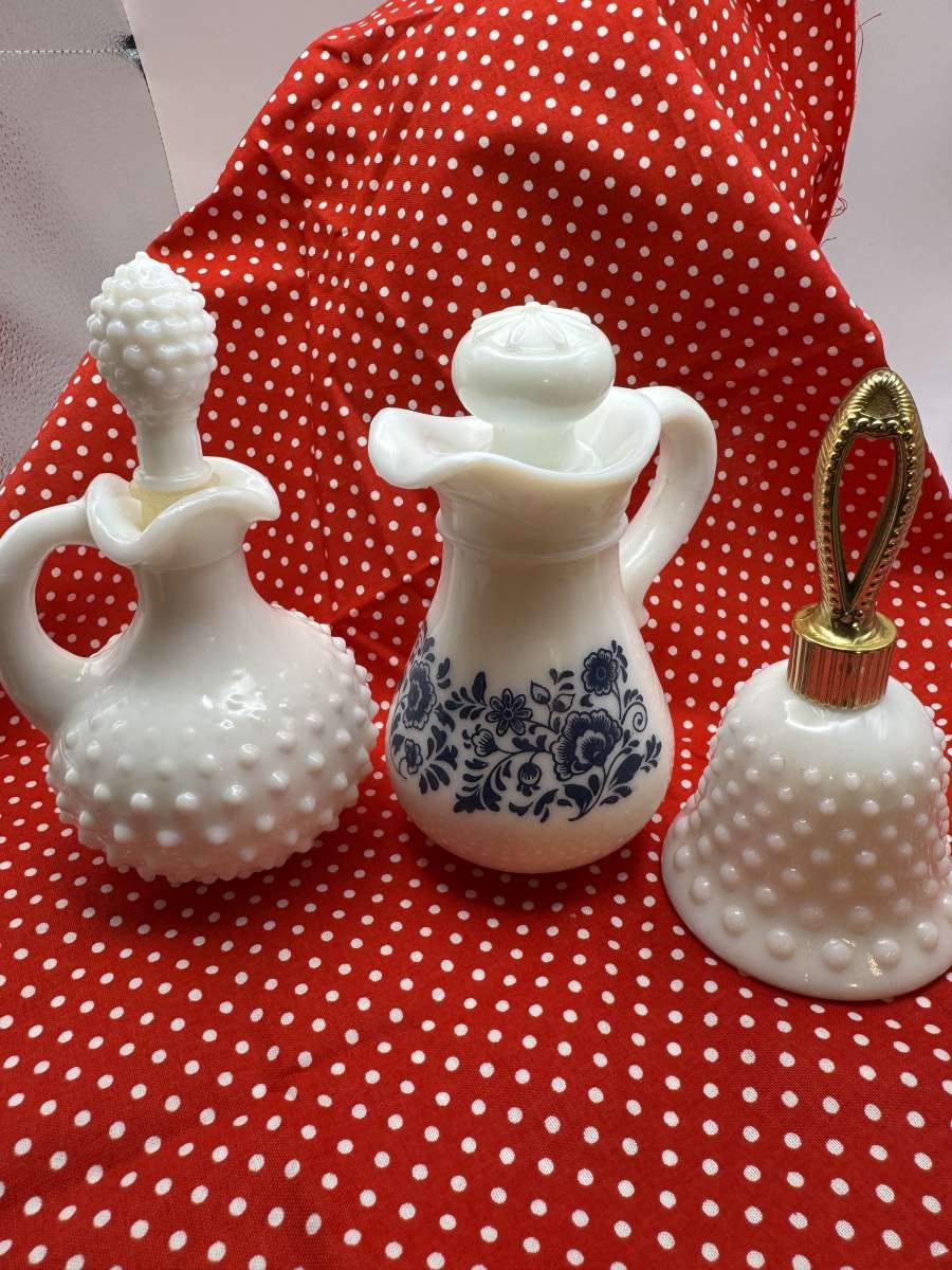 1049Three Avon Milk Glass Containers Two Pitchers  Bell