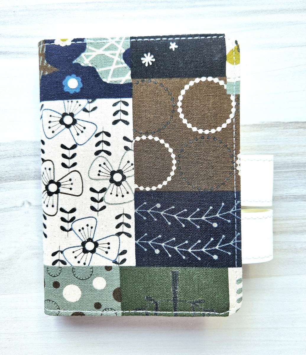 Item Small Fabric Covered Gridded Journals