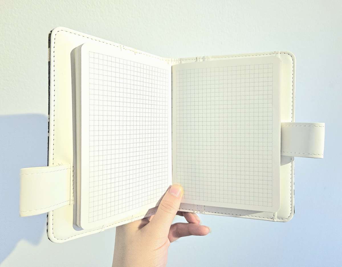 Item Small Fabric Covered Gridded Journals