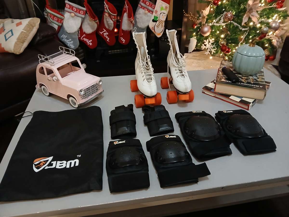 Roller Derby classic roller skates with pads and guards