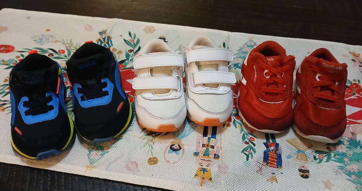 Lot of baby shoes Nike Reebok and Puma 4C