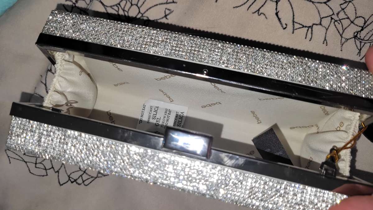 brand new with tags bebe clutch