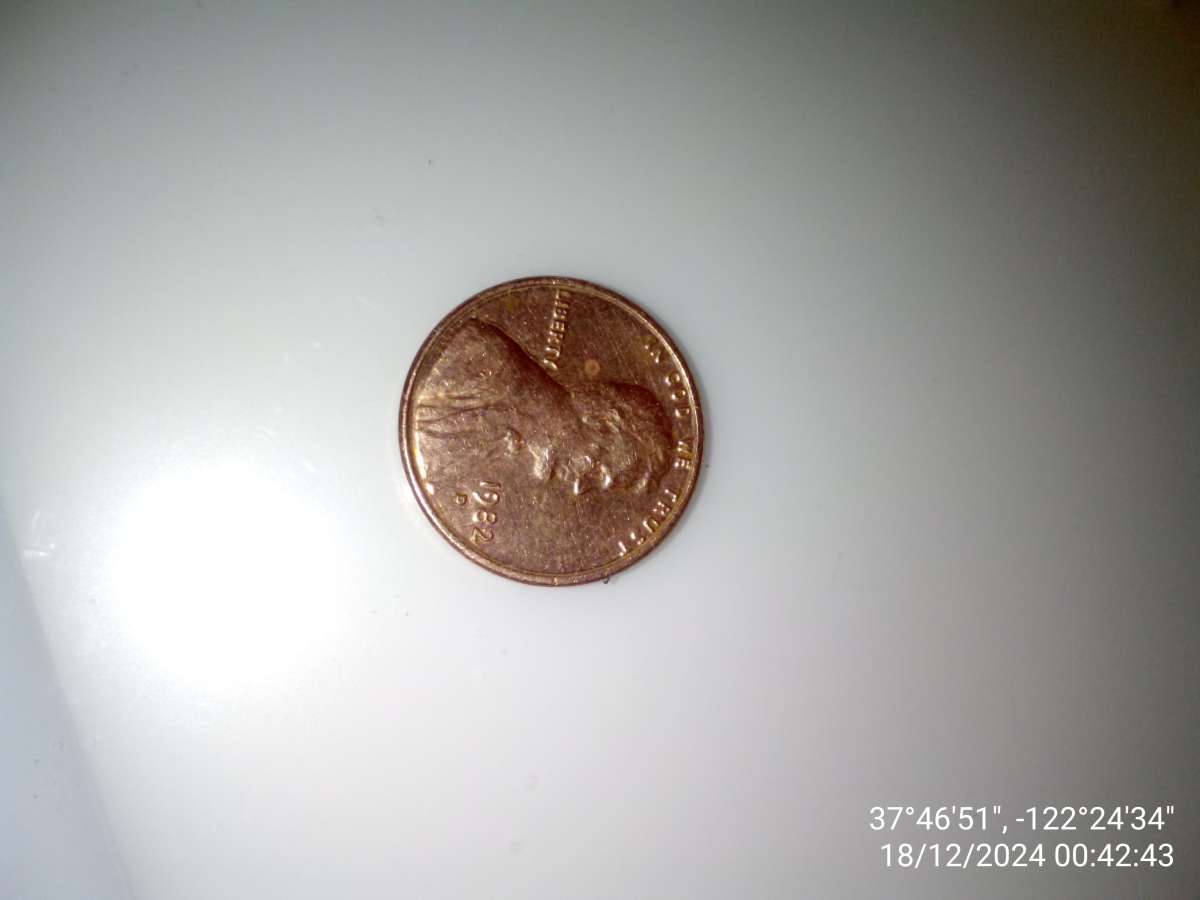 1982 filled D penny with date stamp error