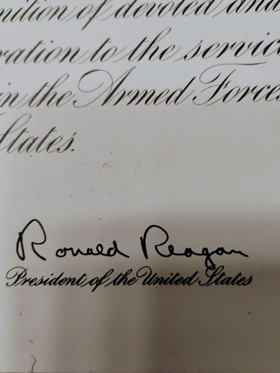 military in memory of signed by Ronald Reagan